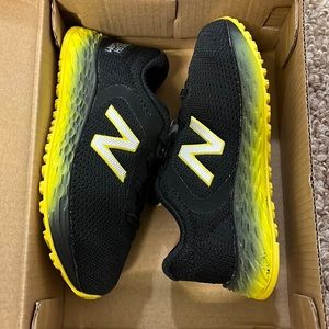 New balance infant size 6w black and yellow sneaker